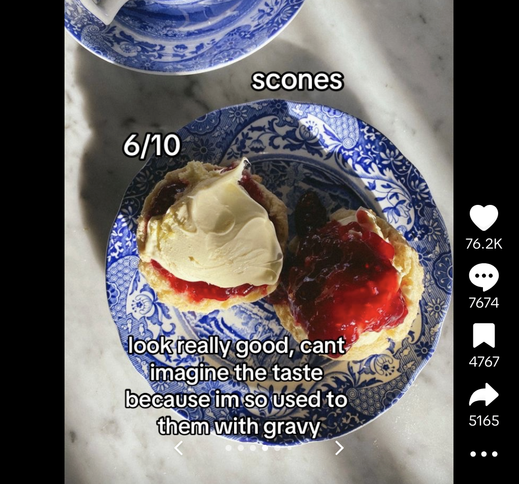British scones with jam and cream on a plate in a TikTok video